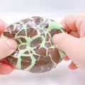 Crunchy Squeeze Ball — crunchy squeeze ball filled with crispy beads, close-up view