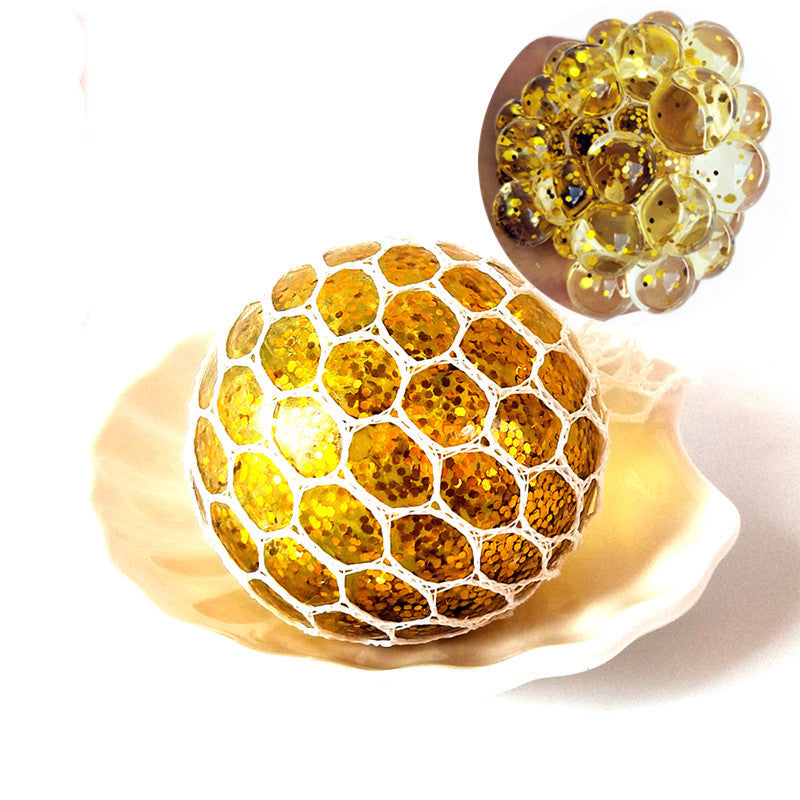 Grape Pop Ball — grape mesh pop squeeze ball, close-up view