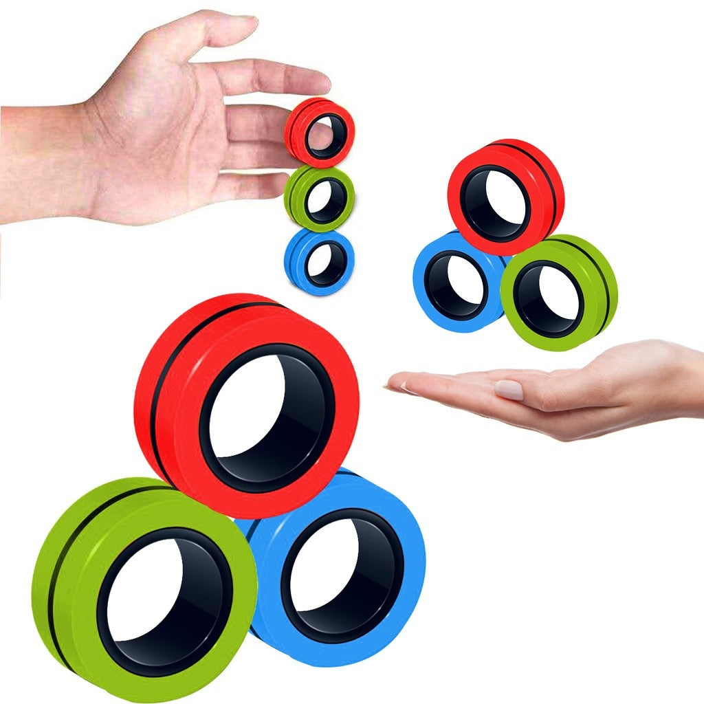 Magnetic Rings in red, green and blue flipped between hands
