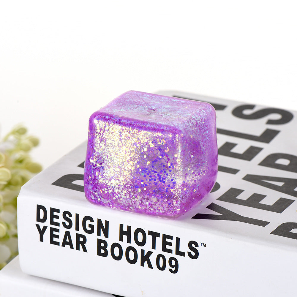 Glacier Dough Cube — pastel glitter dough cube with a slow rebound, different angle