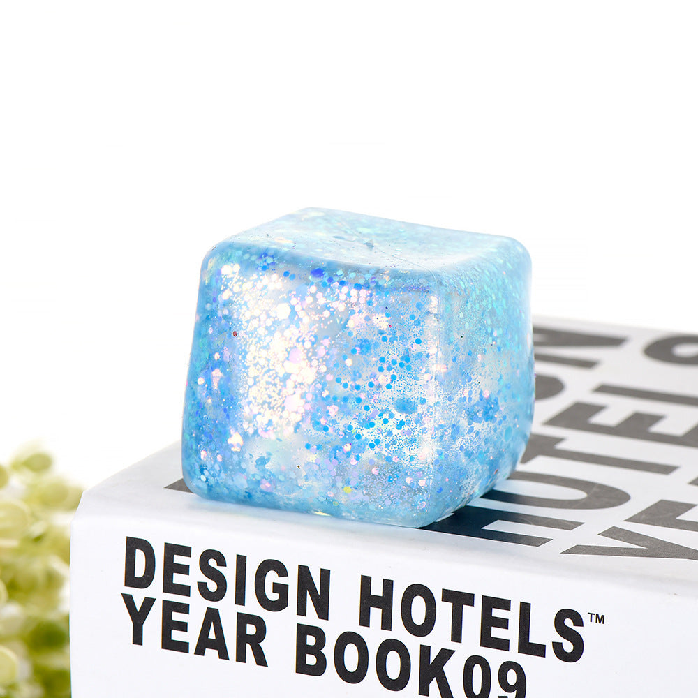 Glacier Dough Cube — pastel glitter dough cube with a slow rebound, side view