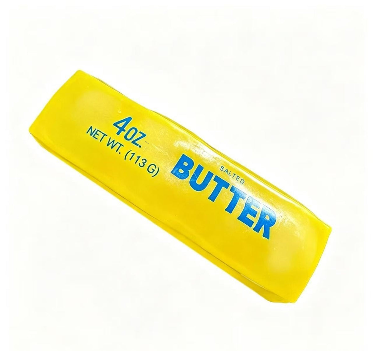 Butter Stick Squishy being squeezed in hand — soft, slow-rebound butter stick toy