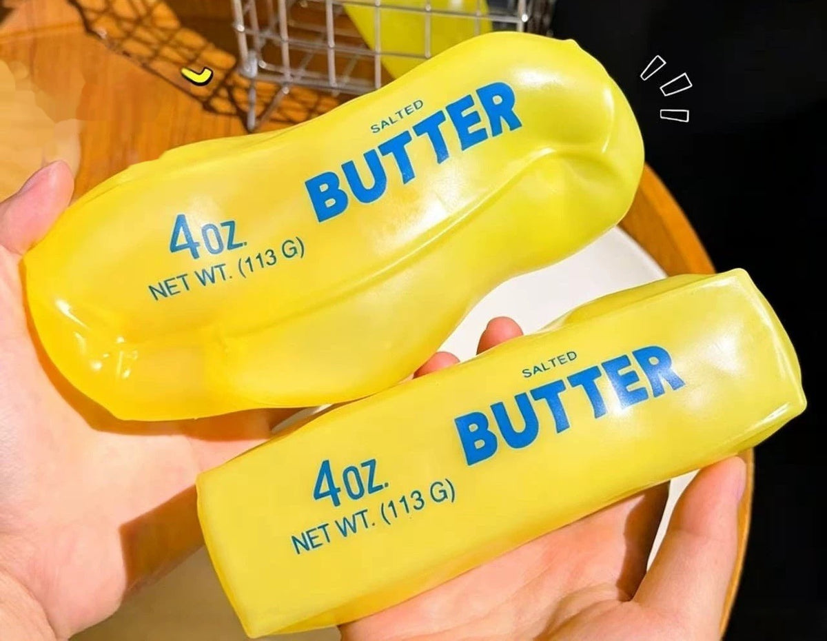 Butter Stick Squishy held in palm — palm-sized butter stick fidget toy