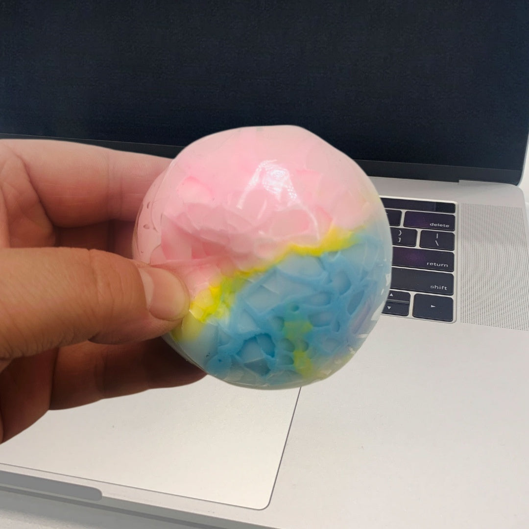 Crunchy Squeeze Ball — crunchy squeeze ball filled with crispy beads, side angle
