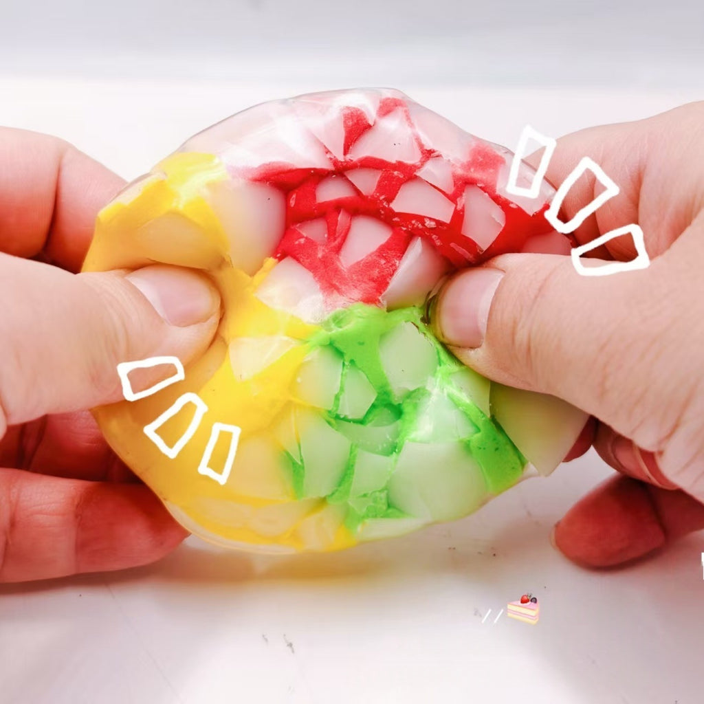 Crunchy Squeeze Ball — crunchy squeeze ball filled with crispy beads, detail close-up