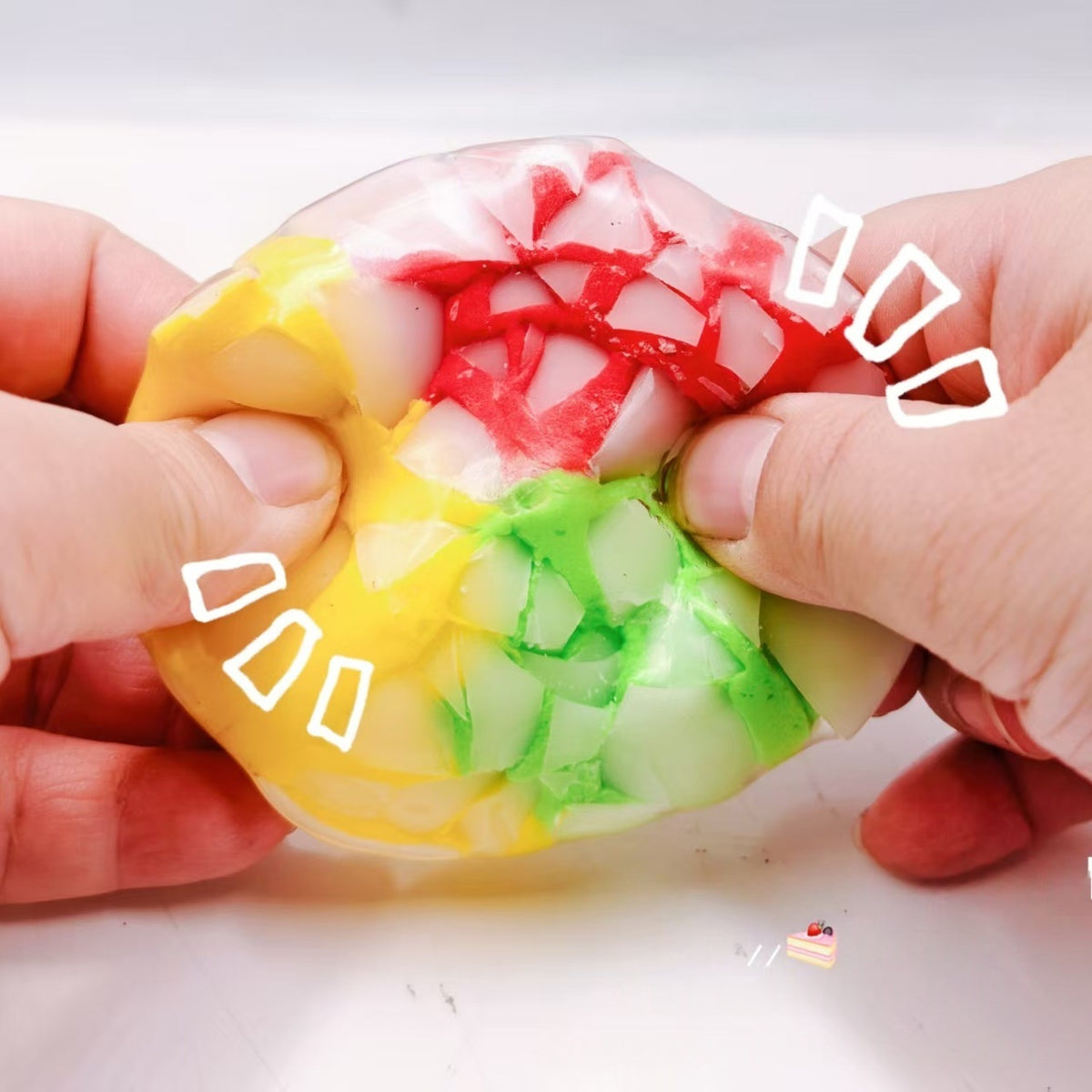 Crunchy Squeeze Ball — crunchy squeeze ball filled with crispy beads, detail close-up