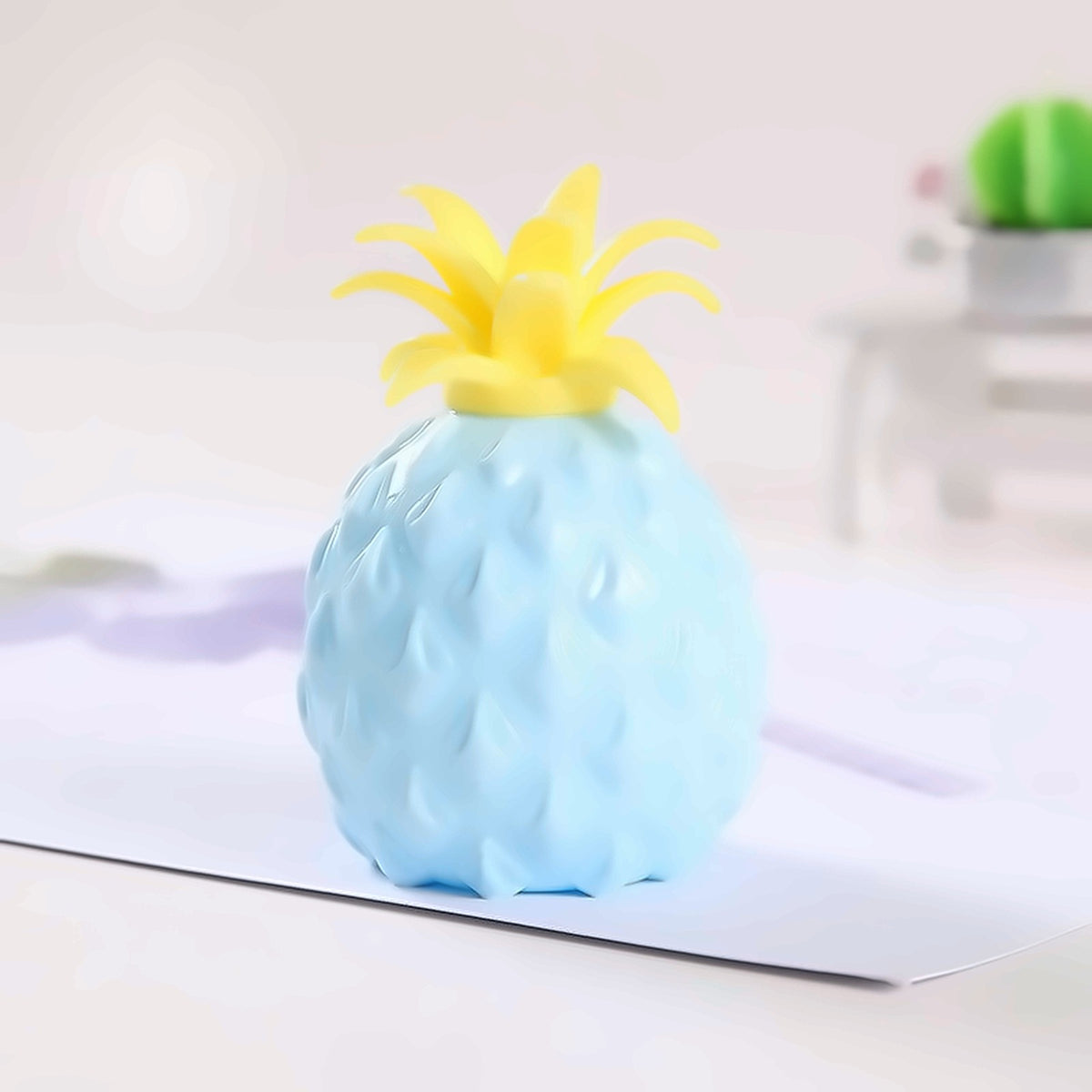 Pineapple Pop Ball — pineapple mesh pop squeeze ball, detail close-up